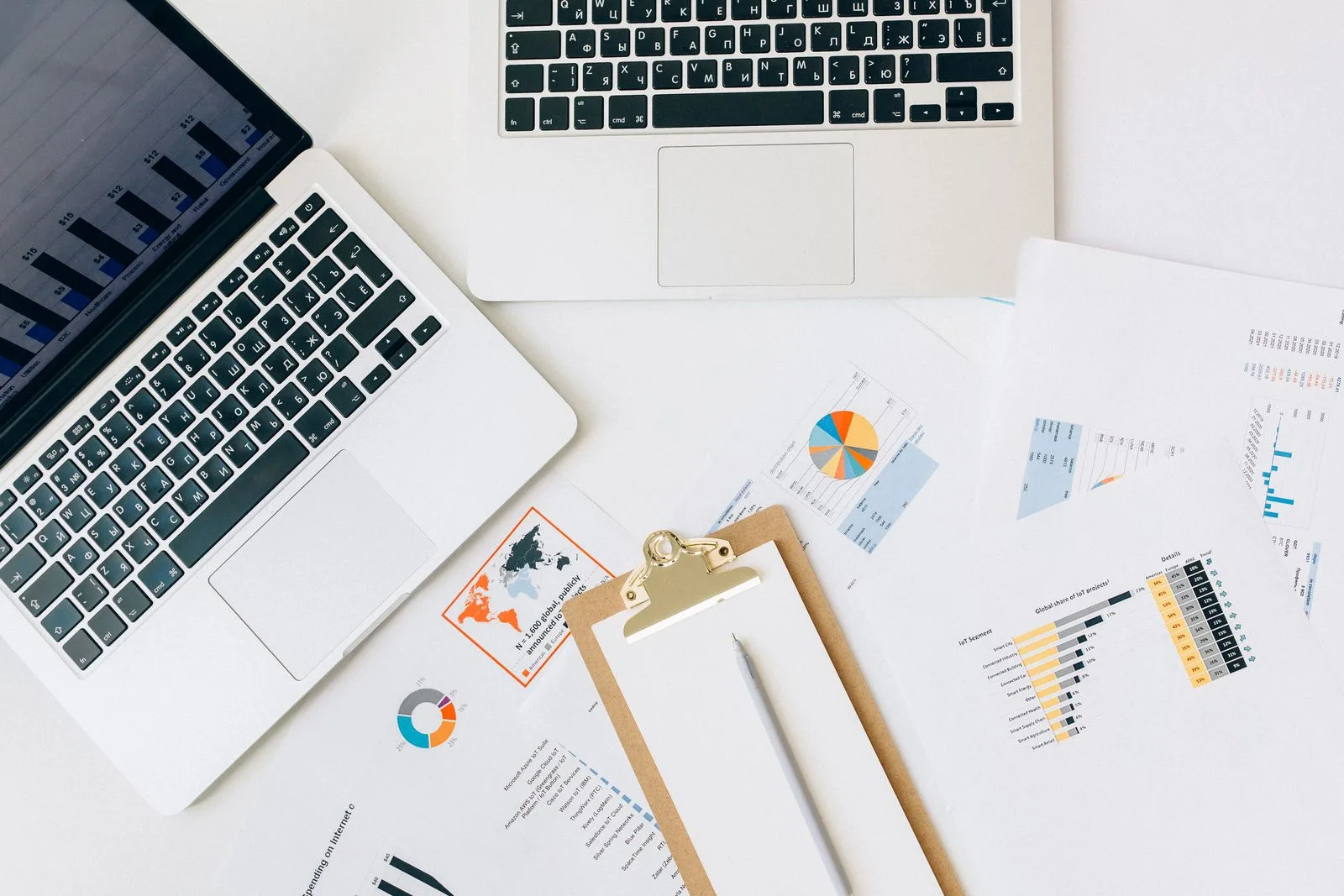 Laptop and documents on a desk — the Docu Stop guides hub for PDF and image tasks